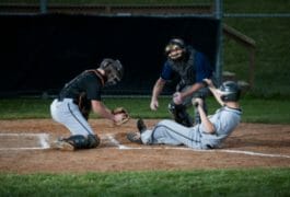 baseball player sliding home